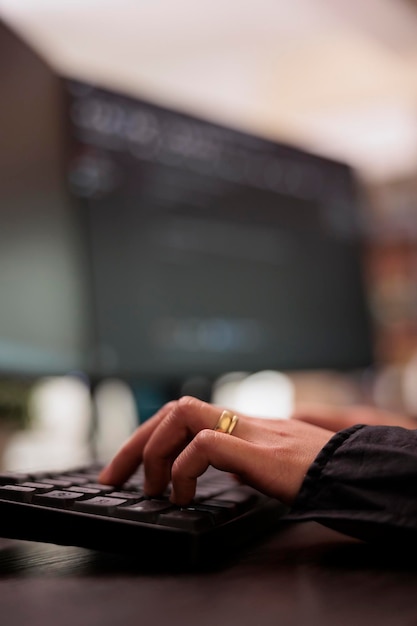 system engineer writing programming language on computer, using database code to develop server interface. freelance coder analyzing html script working in it development agency. close up