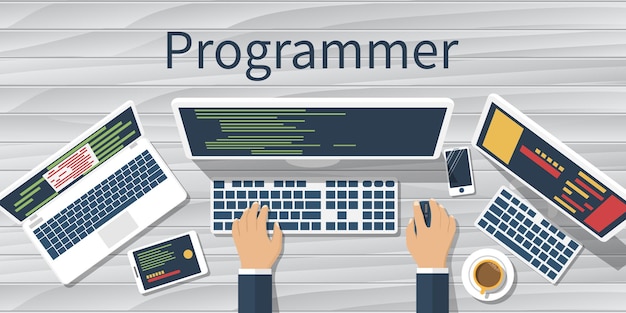 programmer at computer desk working on program software concept coding web technology
